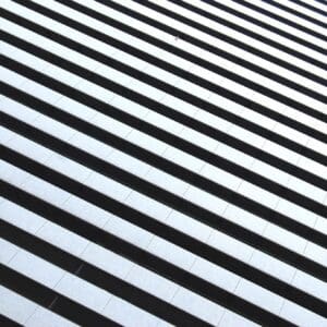 A black and white striped background with lines.