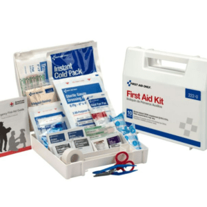 First aid kit with supplies and guide.
